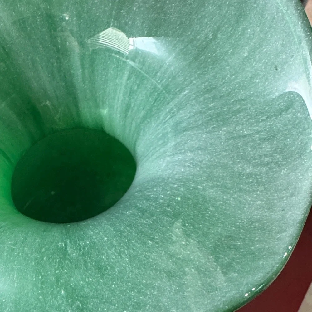 Elegant Hibiscus Fluted Vase in green glass.